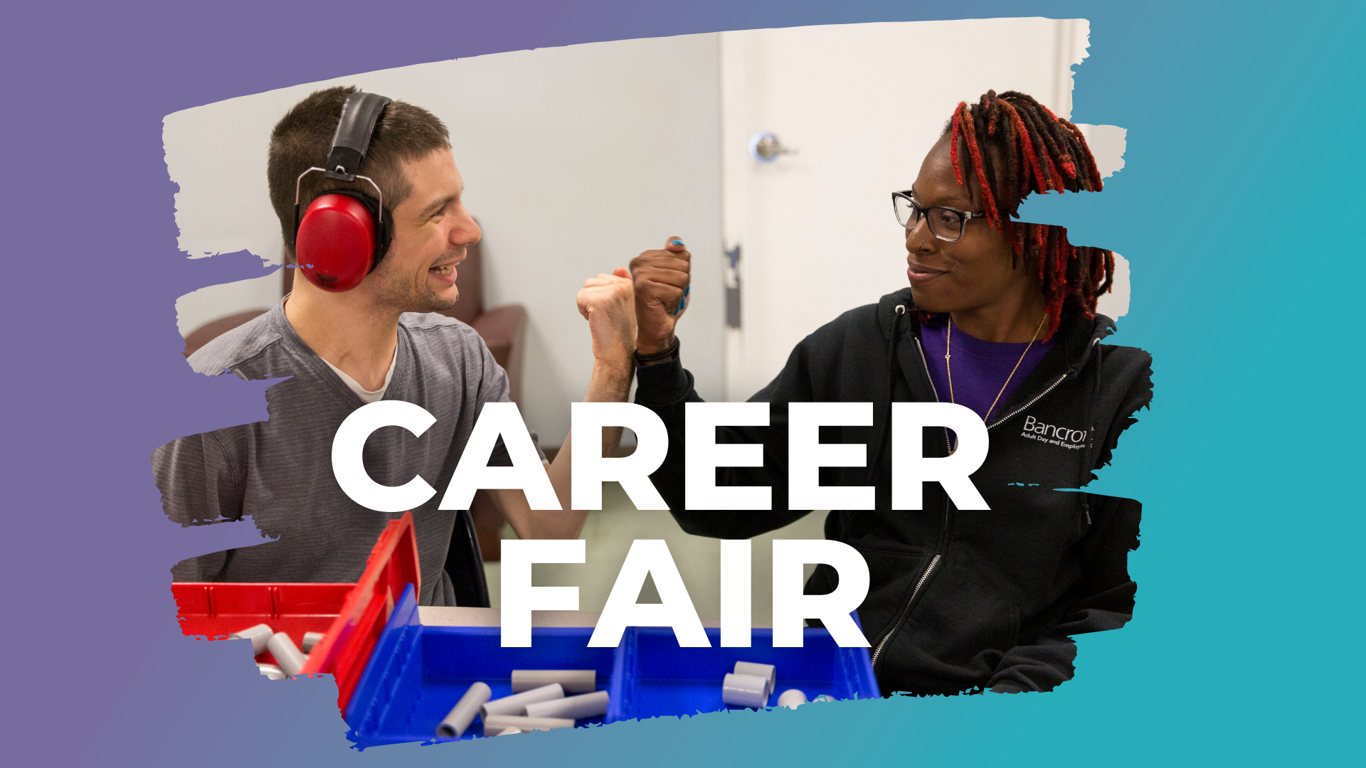Direct Support Professional giving high five to individual with autism behind Career Fair Text